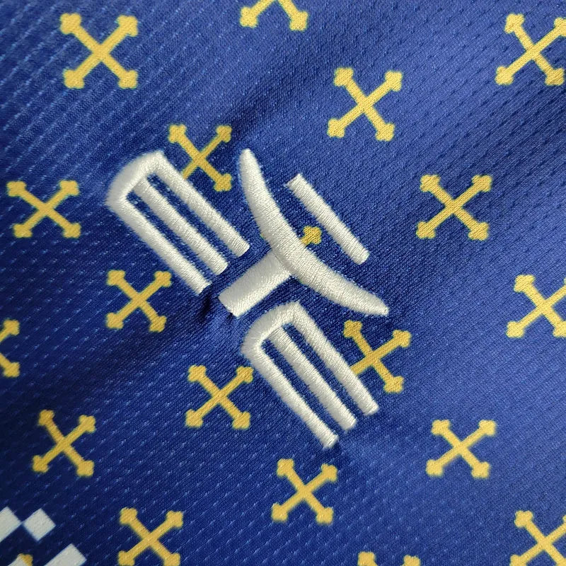 Camisa Cagliari Edição Especial 23/24 - Torcedor Eye Masculina - Azul com detalhes em amarelo e vermelho