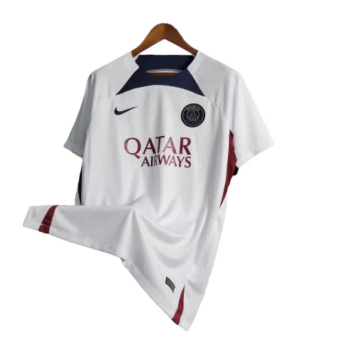 Camisa Paris Saint-Germain Treino 23/24 - Torcedor Nike Masculina - Branca com detalhes em azul e vermelho