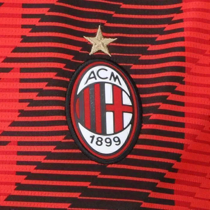 Camisa AC Milan I 23/24 - Torcedor Puma Feminina - Vermelha e preta