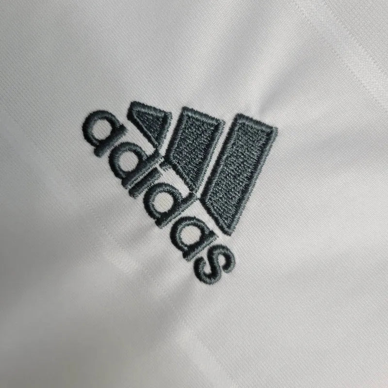 Camisa Retrô Real Madrid I 13/14 - Masculina Adidas - Branca com detalhes em laranja e cinza