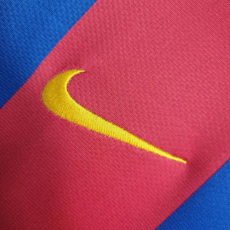 Camisa Retrô Barcelona I 10/11 - Masculina Nike - Azul e vermelha com detalhes em amarelo