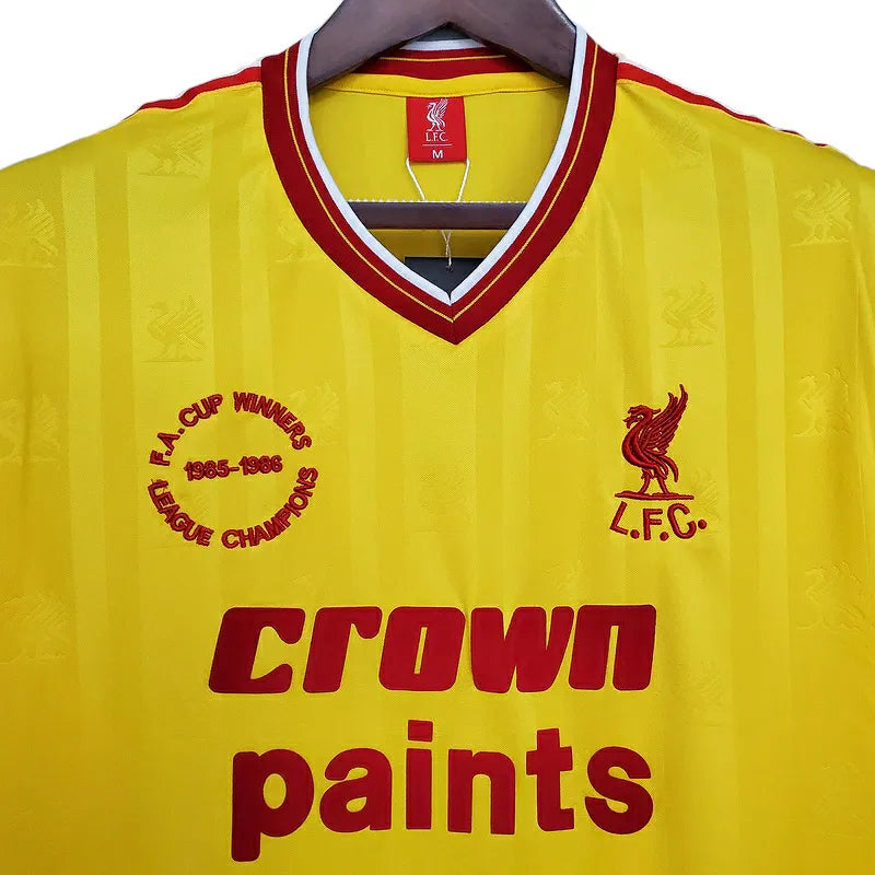 Camisa Retrô Liverpool 1985/1986 - Masculina - Amarela com detalhes em vermelho e branco