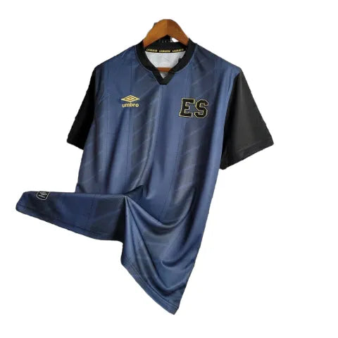 Camisa El Salvador 23/24 Torcedor Umbro Masculina - Azul com detalhes em preto e dourado