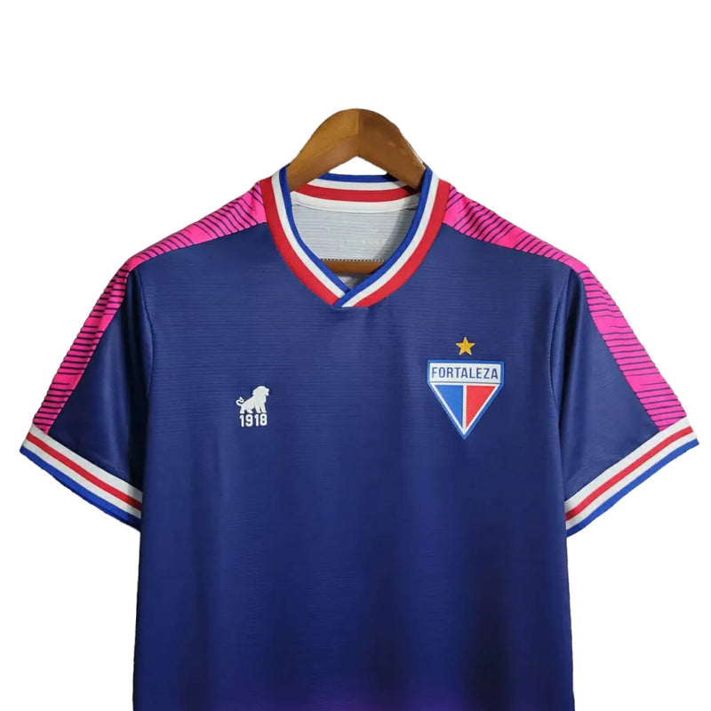 Camisa Fortaleza Edição Especial Outubro Rosa 23/24 - Torcedor Lobo Masculina - Azul com detalhes em rosa