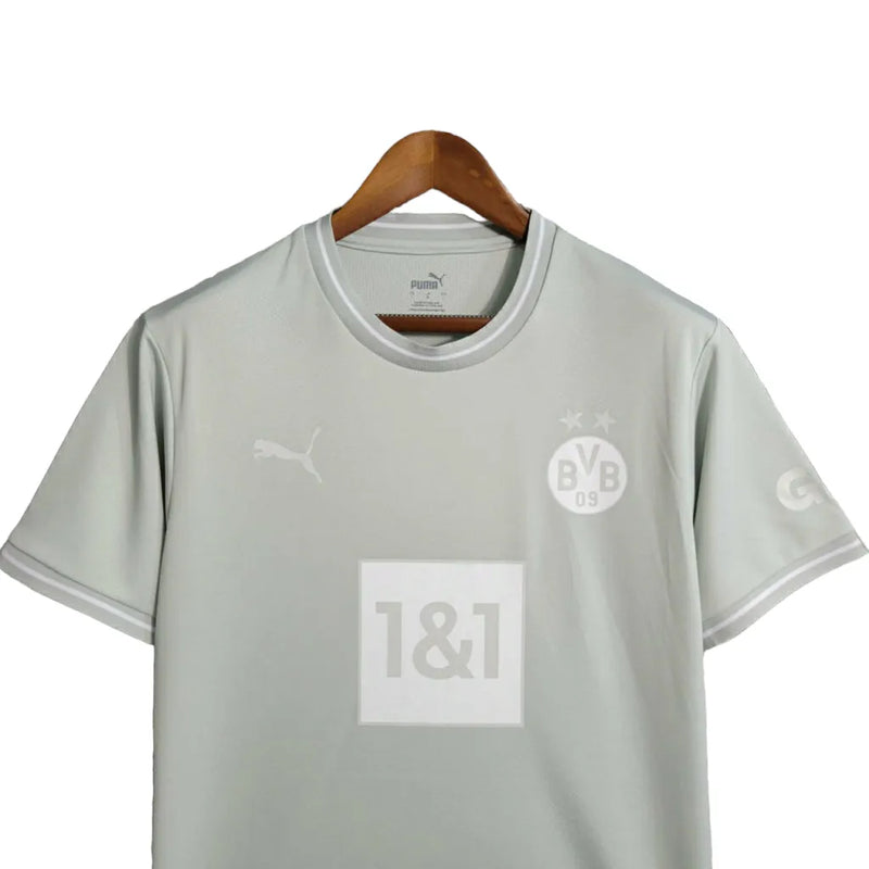 Camisa Borussia Dortmund Treino 23/24 - Torcedor Puma Masculina - Cinza com detalhes em branco