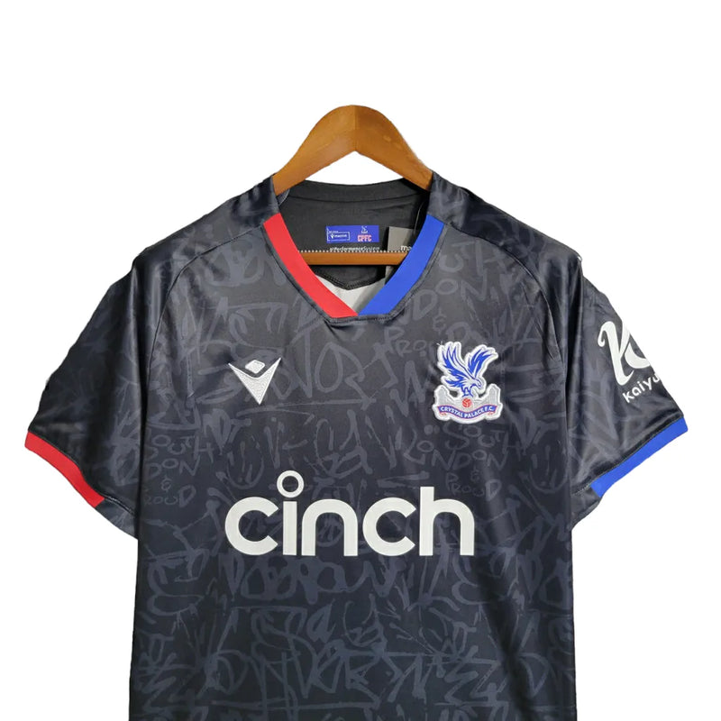 Camisa Crystal Palace III 23/24 - Torcedor Macron Masculina - Preta com detalhes em vermelho e azul