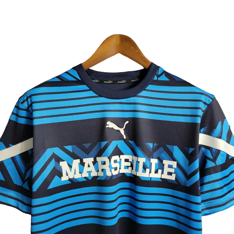 Camisa Marseille Treino 23/24 - Torcedor Puma Masculina - Azul com detalhes em preto e branco