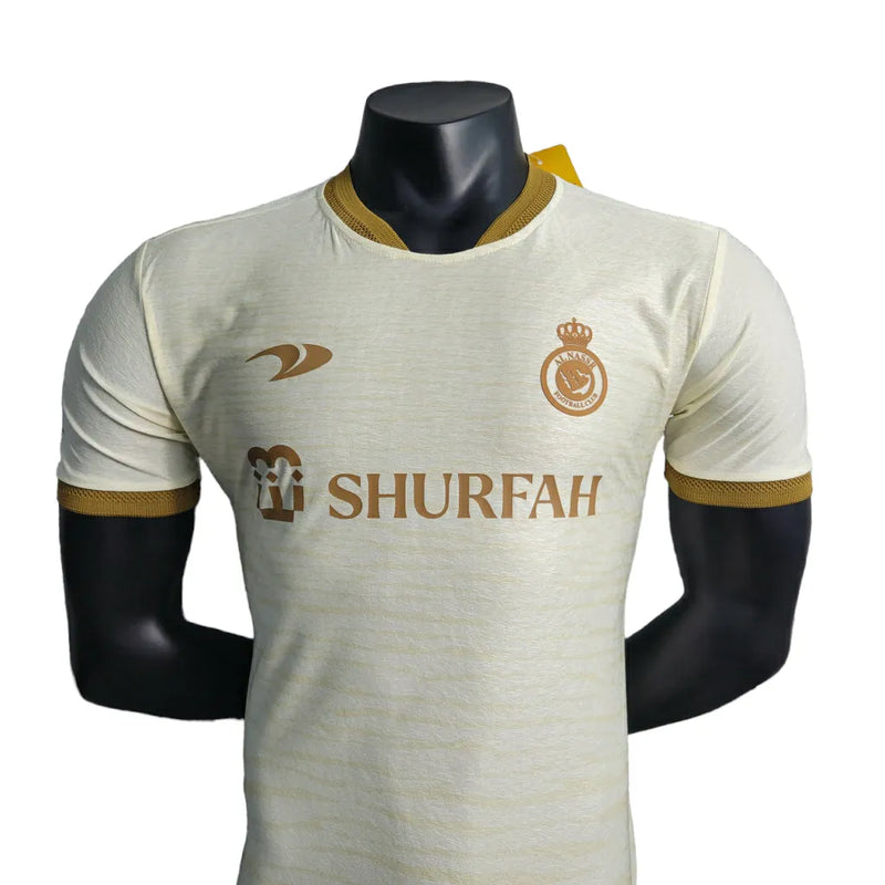 Camisa Al-Nassr III 23/24 - Jogador Duneus Masculina - Bege com detalhes em dourado