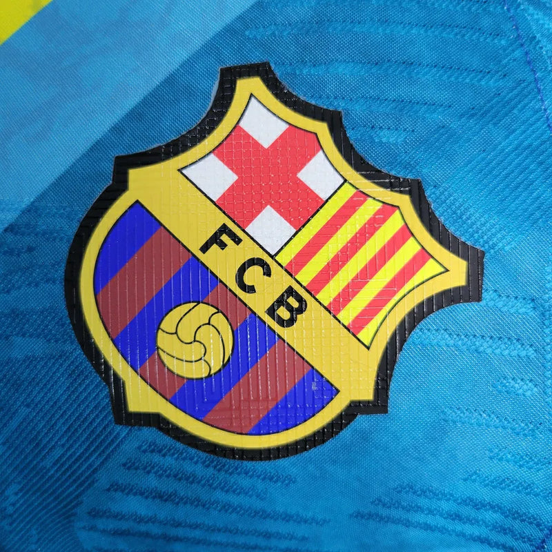 Camisa Barcelona Edição Especial 23/24 - Jogador Nike Masculina - Azul com detalhes em amarelo e vermelho