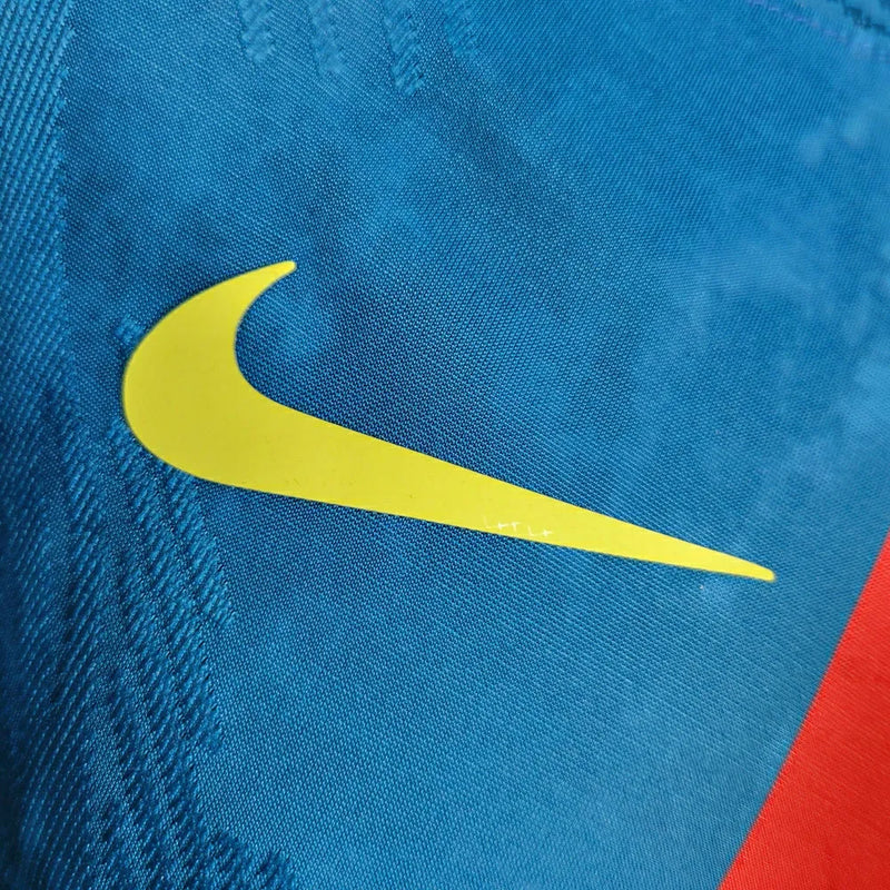 Camisa Barcelona Edição Especial 23/24 - Jogador Nike Masculina - Azul com detalhes em amarelo e vermelho