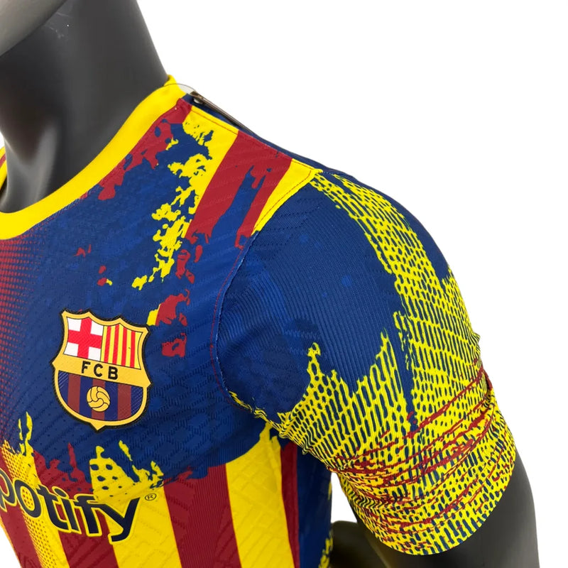 Camisa Barcelona Edição Especial 23/24 - Jogador Nike Masculina - Azul escuro com detalhes em vermelho e amarelo