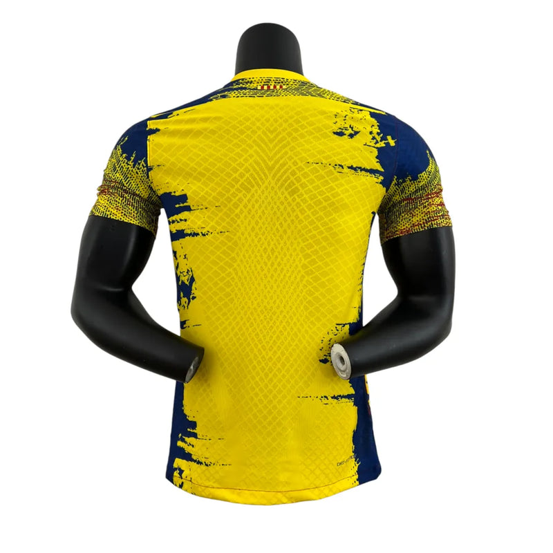 Camisa Barcelona Edição Especial 23/24 - Jogador Nike Masculina - Azul escuro com detalhes em vermelho e amarelo