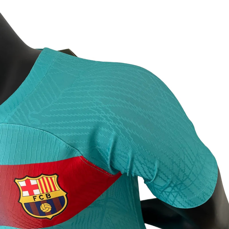 Camisa Barcelona III 23/24 - Jogador Nike Masculina - Verde com detalhes em azul e vermelho