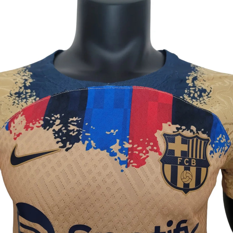 Camisa Barcelona Edição Especial 23/24 - Jogador Nike Masculina - Bege com detalhes azul e vermelho