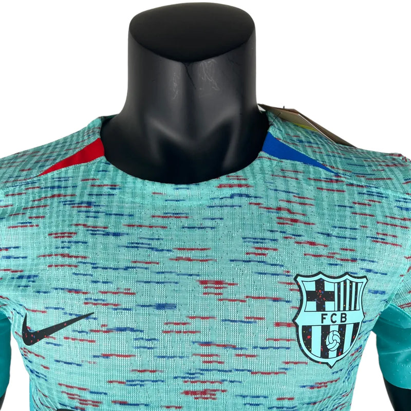 Camisa Barcelona III 23/24 - Jogador Nike Masculina - Azul com detalhes em vermelho e amarelo