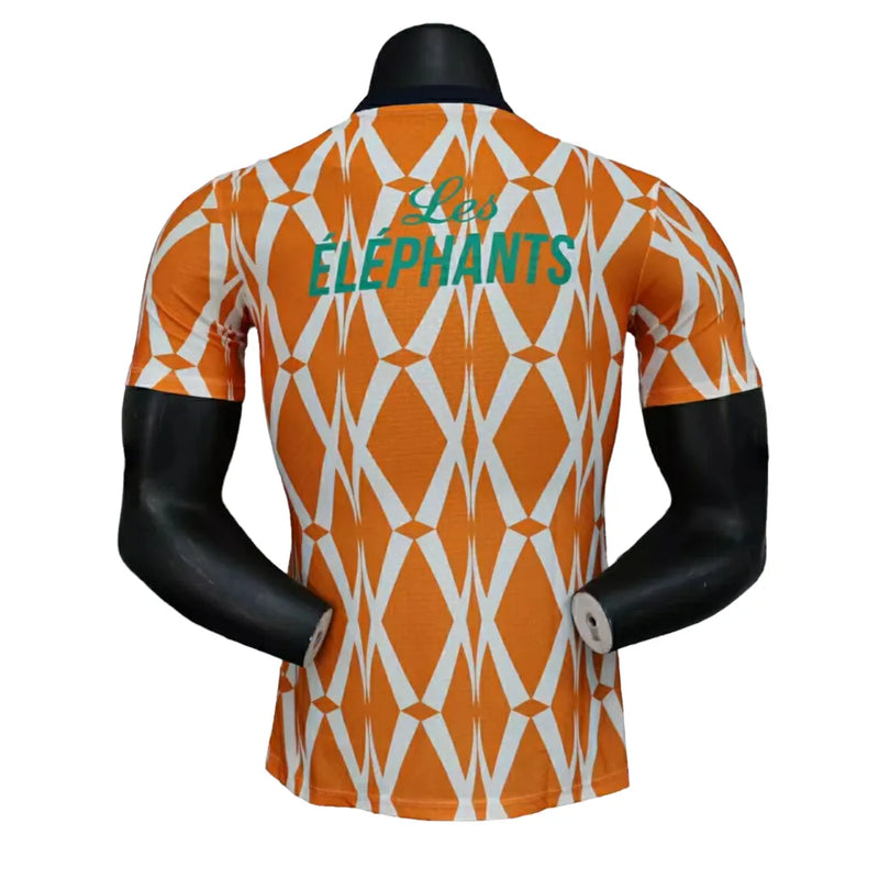 Camisa Costa do Marfim Pré-Jogo 23/24 - Jogador Puma Masculina - Laranja com detalhes em branco e verde