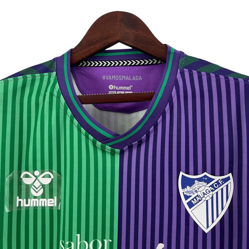 Camisa Málaga II 23/24 - Torcedor Hummel Masculina - Verde e roxo com detalhes em azul