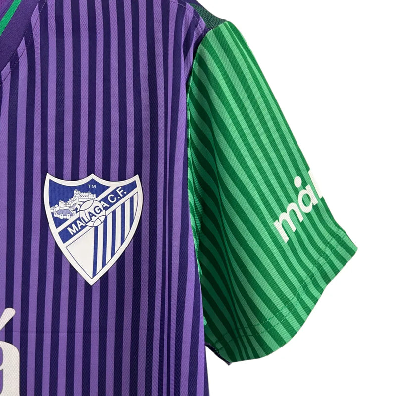 Camisa Málaga II 23/24 - Torcedor Hummel Masculina - Verde e roxo com detalhes em azul