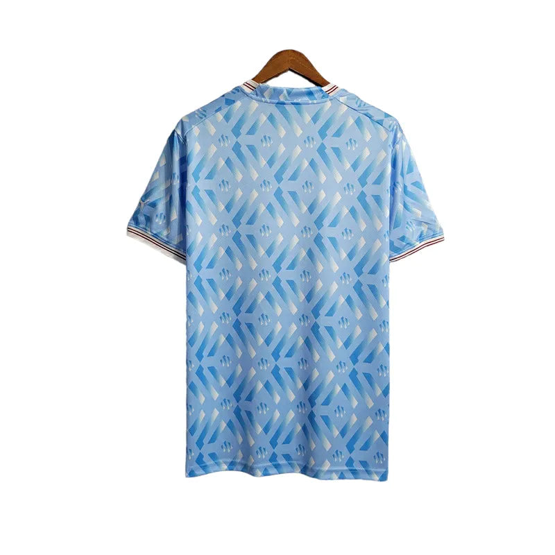 Camisa Olympique Marseille Treino 23/24 - Torcedor Puma Masculina - Azul com detalhes em branco e dourado