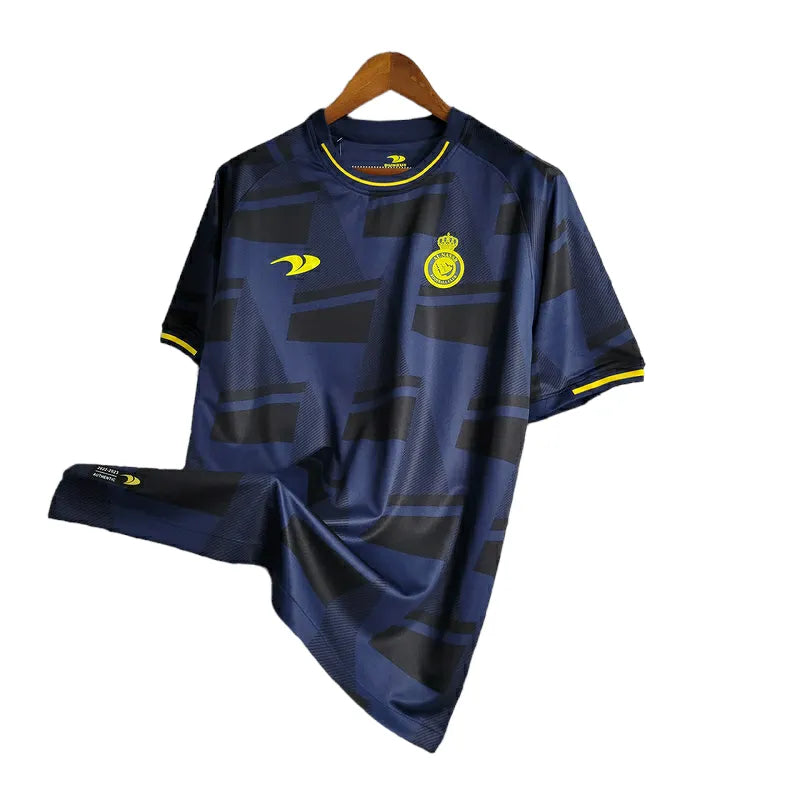 Camisa Al-Nassr Treino 23/24 - Torcedor Dunes Masculina - Azul com detalhes em preto e amarelo