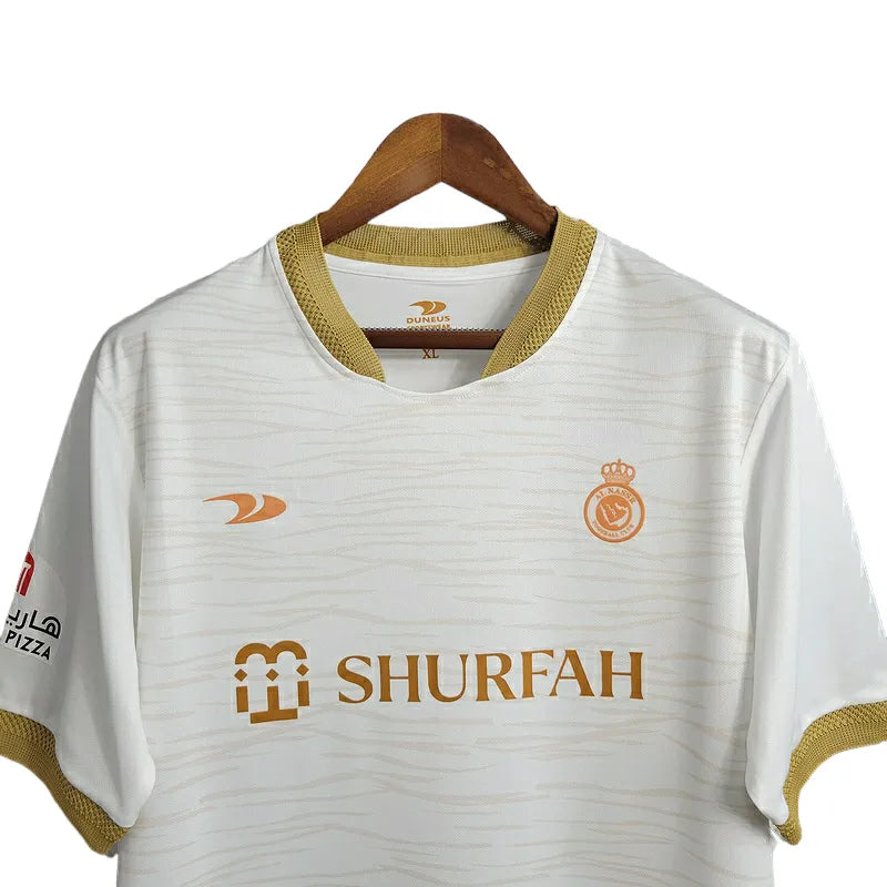 Camisa Al-Nassr III 23/24 - Torcedor Duneus Masculina - Bege com detalhes em dourado