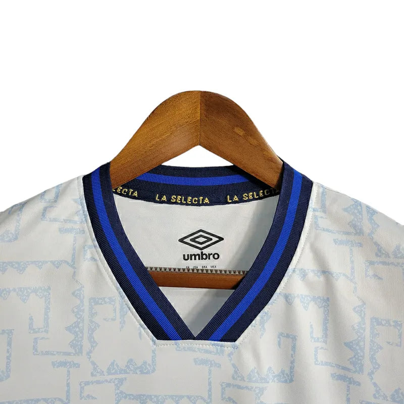 Camisa El Salvador II 23/24 - Torcedor Umbro Masculina - Branca com detalhes em azul e dourado