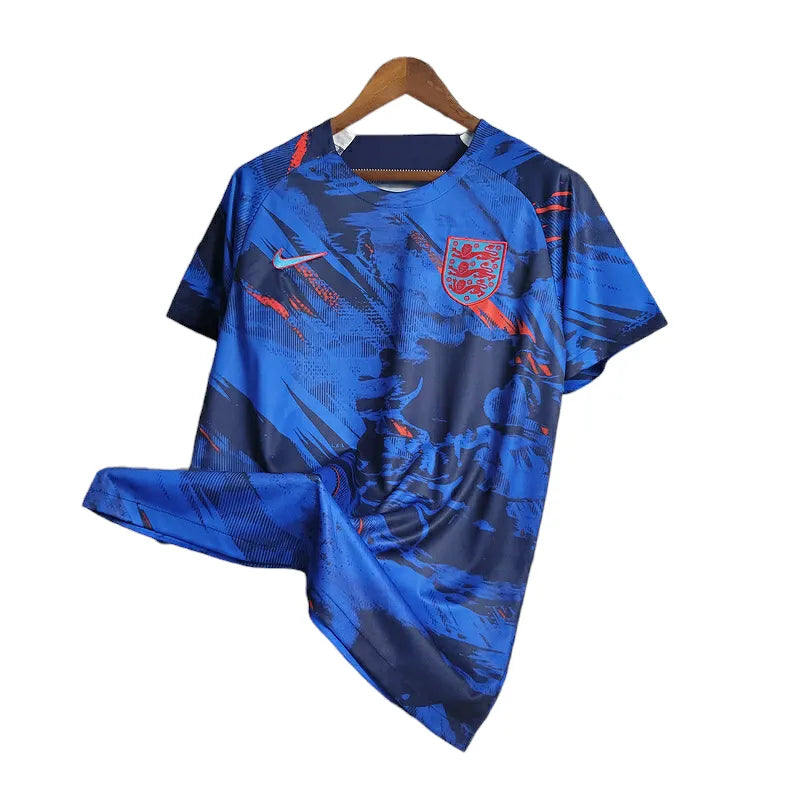 Camisa Seleção da Inglaterra Treino 23/24 - Torcedor Nike Masculina - Azul com detalhes em vermelho