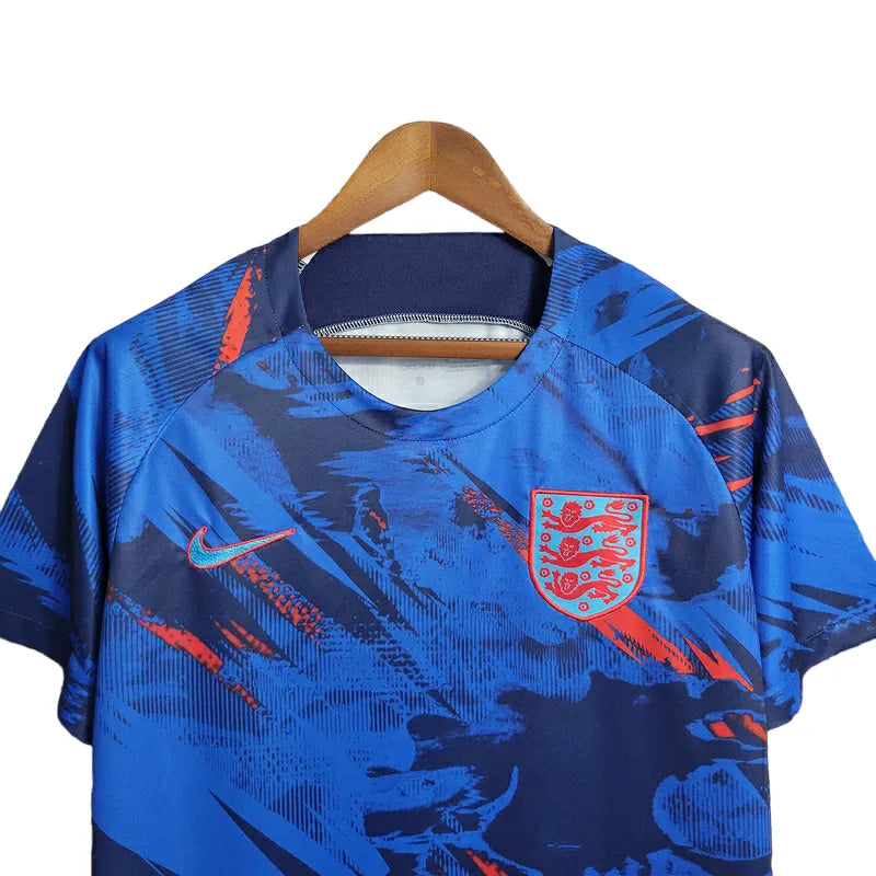 Camisa Seleção da Inglaterra Treino 23/24 - Torcedor Nike Masculina - Azul com detalhes em vermelho