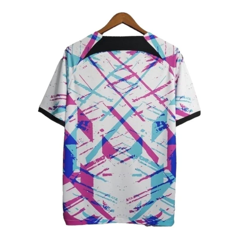 Camisa Treino Barcelona 23/24 - Torcedor Nike Masculina - Branca com detalhes em rosa e azul e verde