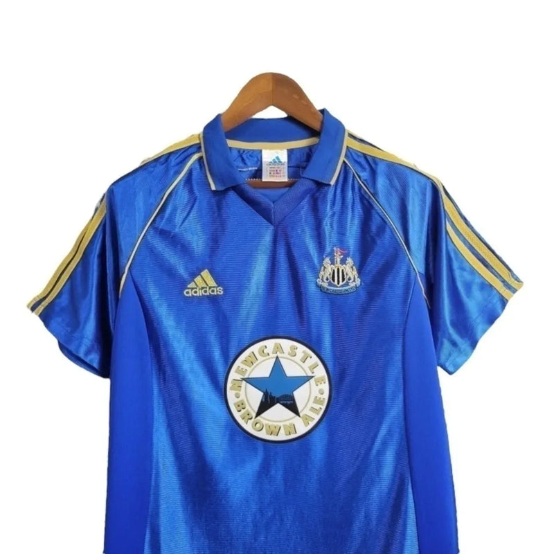 Camisa Newcastle United II Retrô 1998/1999 - Masculina Adidas - Azul com detalhes em dourado