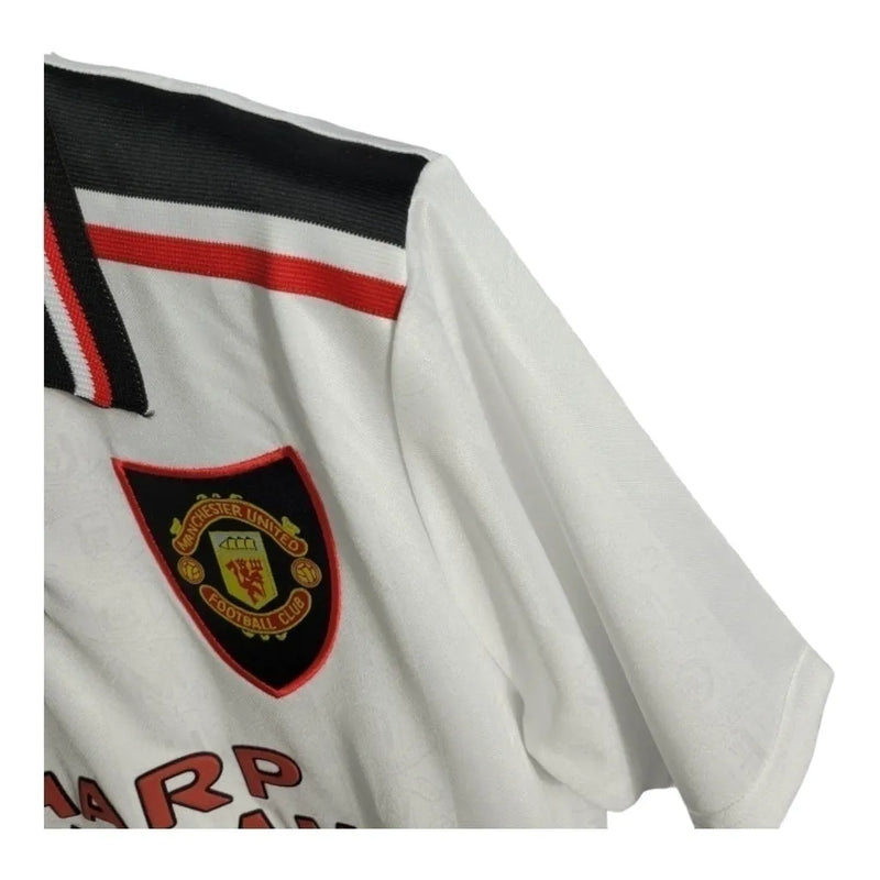 Camisa Retrô Manchester United 98/99 - Masculina Umbro - Branca com detalhes em preto e vermelho